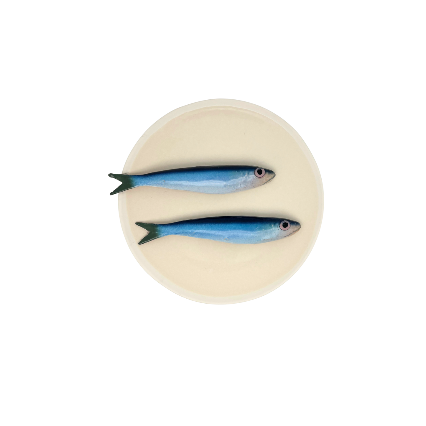 Sardines op een beige bord met lichte rand, 20 cm
