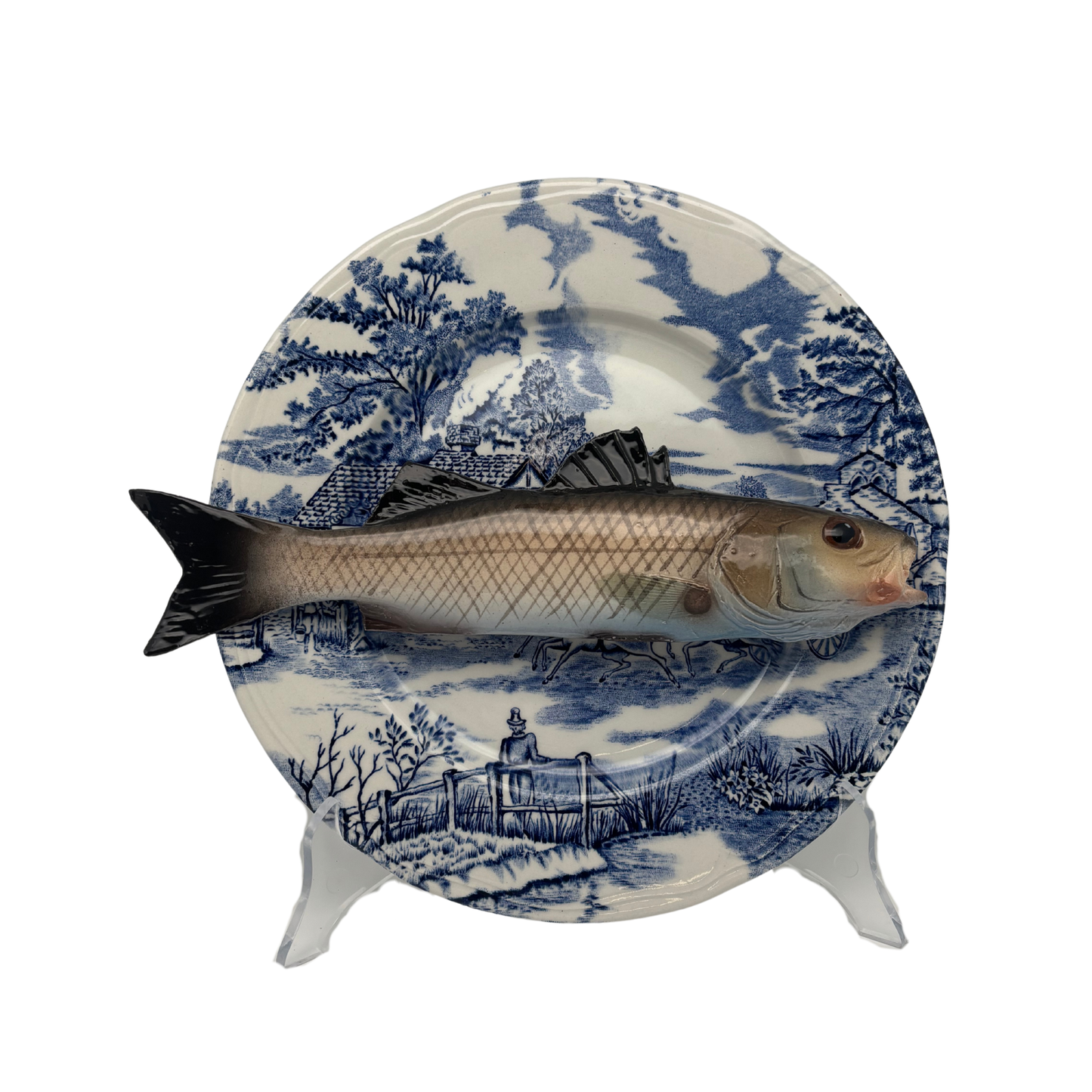 Spigola op blauw vintage bord, 25 cm rond