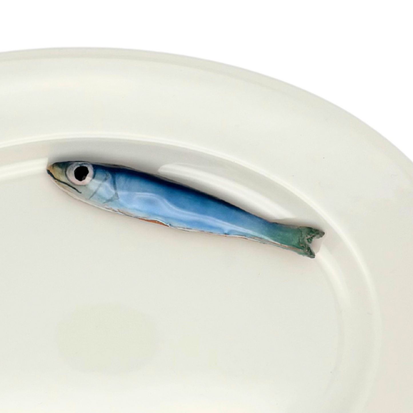 Serveerbordje ovaal wit met sardine piccolo, 24X17cm.