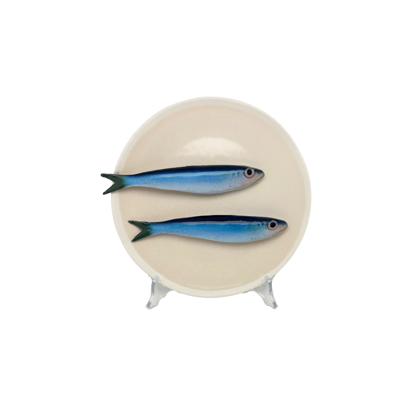 Sardines op een beige bord met lichte rand, 20 cm