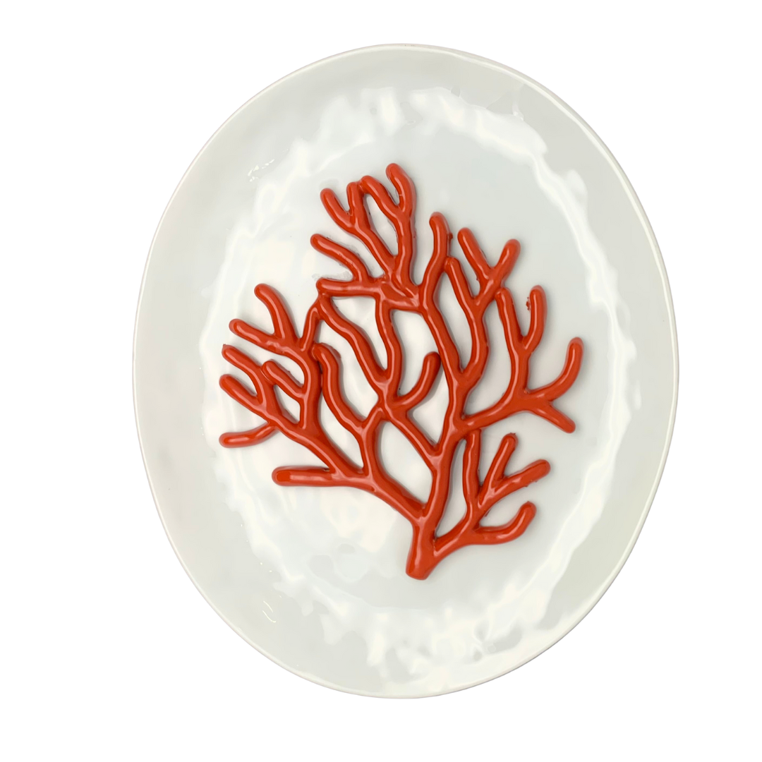 Koraal medio op ovaal wit bord, 27X19cm