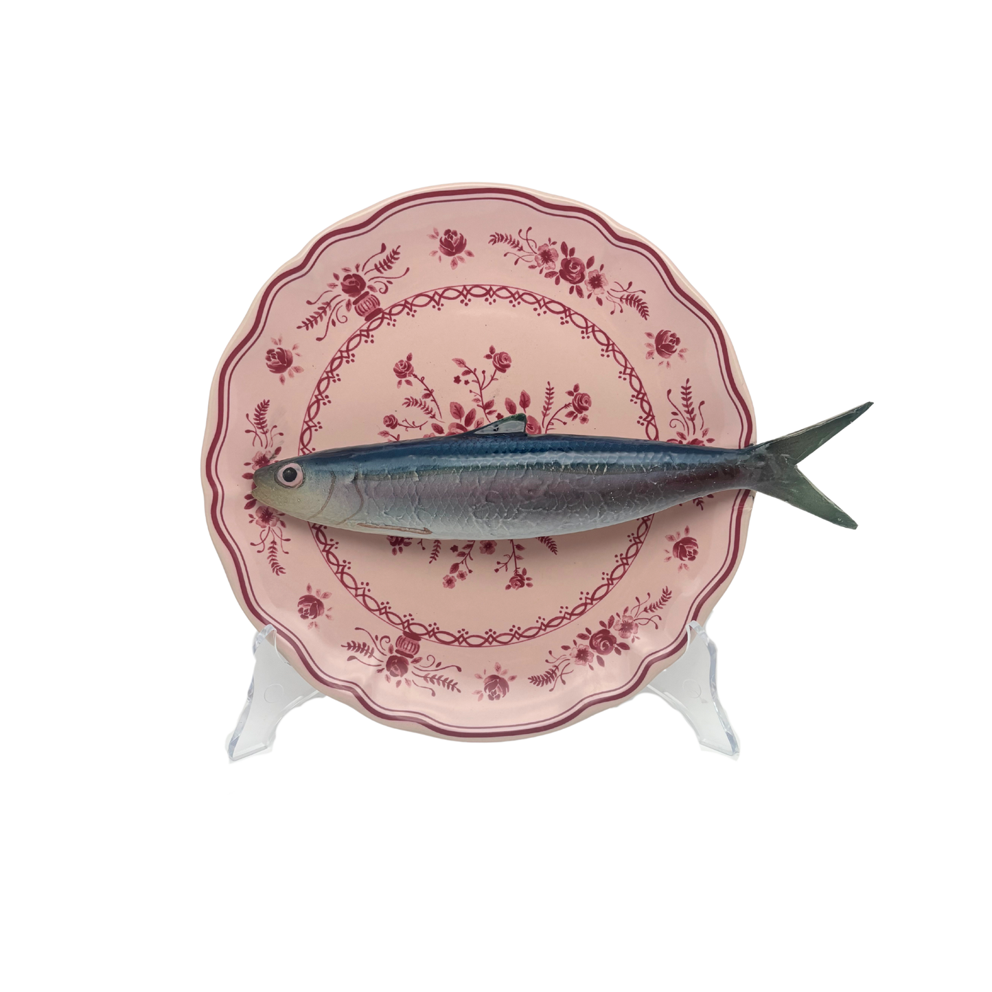 Alaccia/Haring op poederroze bord met rode decoratie 21 cm